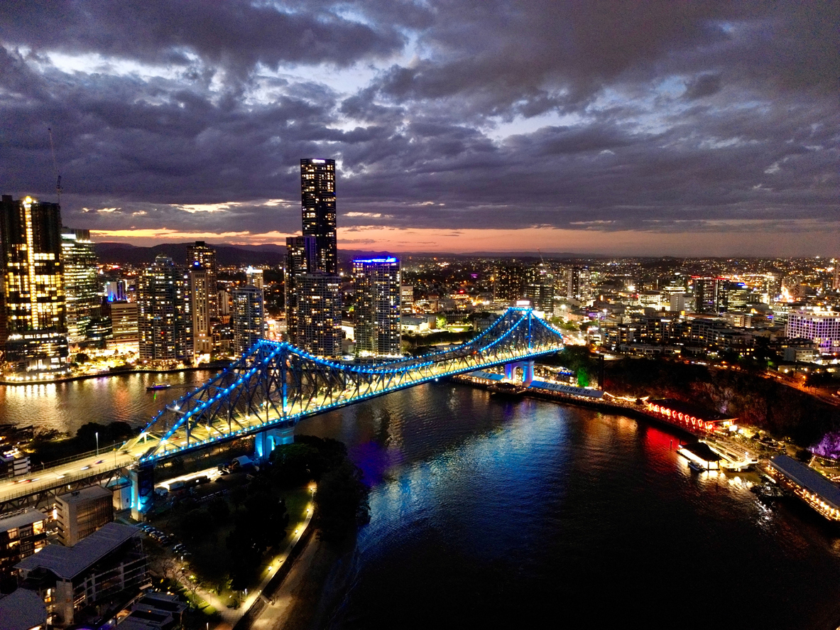 Brisbane city skyline and the Story Bridge lit at dusk